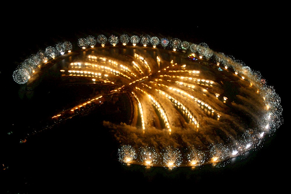 Grand Opening celebration featuring Palm Island illuminated by fireworks