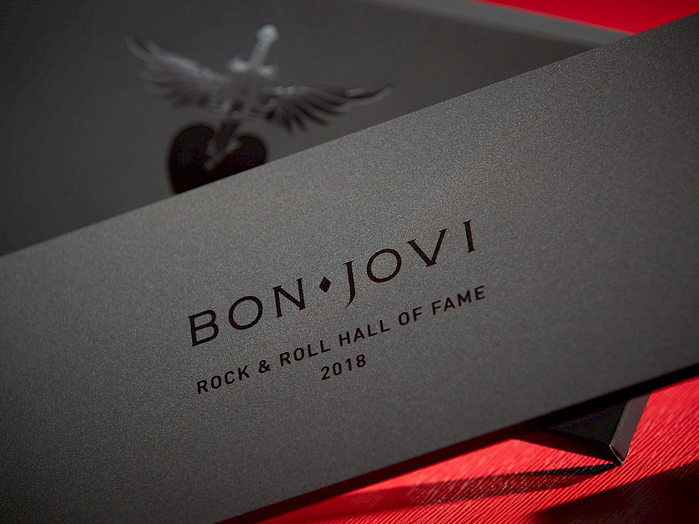 Tone-on-tone, black matte acrylic "slab" invitation