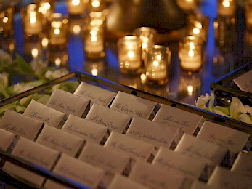 Individually calligraphed table seating cards and envelopes