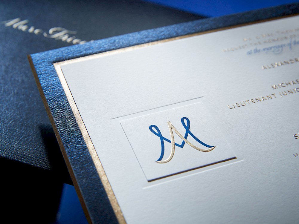 Two-tone engraved bride and groom monogram detail