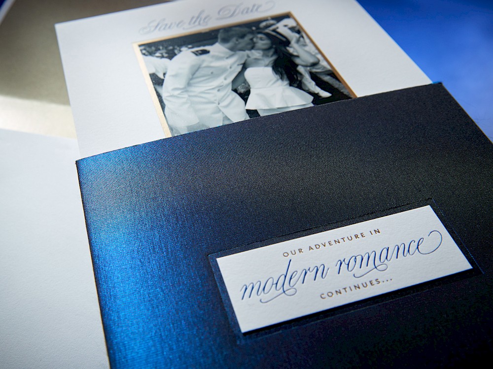 Save-the-date featuring taffeta wrapped sleeve