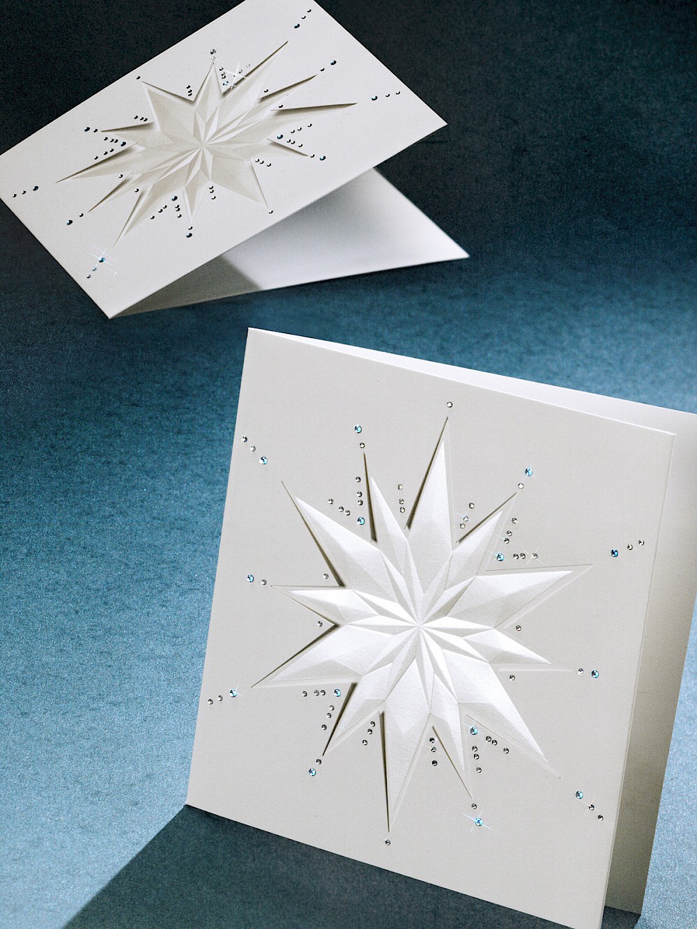 Die-cut, foil, embossed and crystal-embedded holiday card for Swarovski